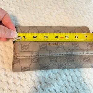 Woman’s Bebe Tan Leather Wallet